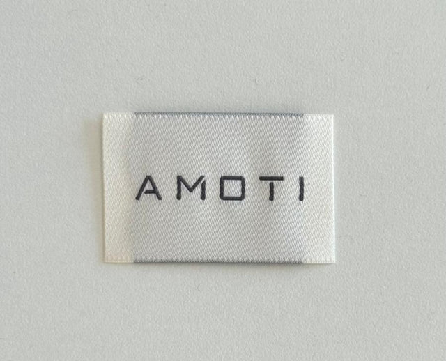 AMOTI Custom Neck Label.