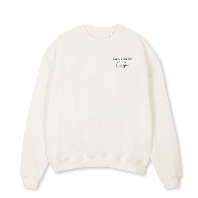FATIMACREWVINTAGE Vintage White Oversized Crewneck Sweater.