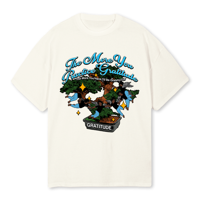 THEMORE Cream Oversized Tee.