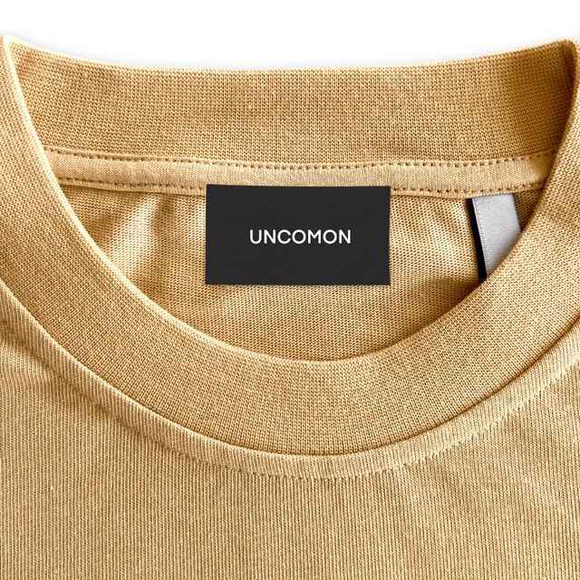 UNCOMON Custom Neck Label.